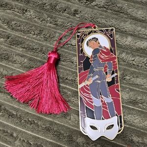 Elegant Bookmark with Red Tassel and Mask Design